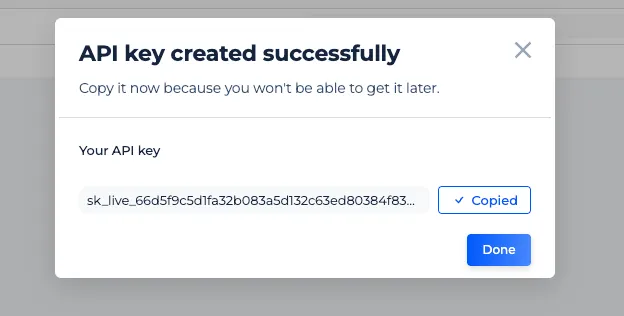 Sitechecker dialog confirming the API key was created, with the full key and a Copy button